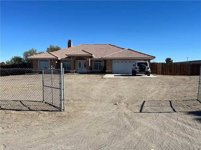 view of front of home with a garage