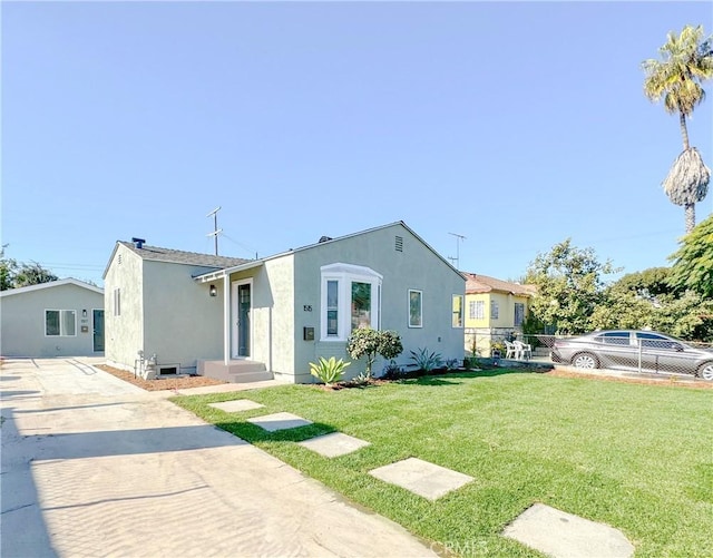 view of front of home with a front yard