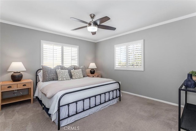 carpeted bedroom with multiple windows, ornamental molding, and ceiling fan