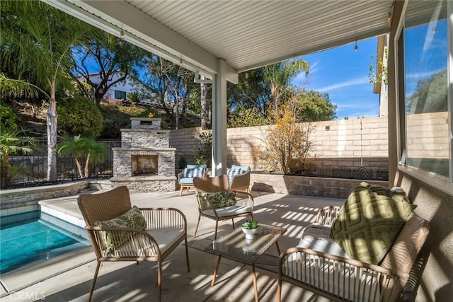 view of patio / terrace featuring an outdoor living space with a fireplace