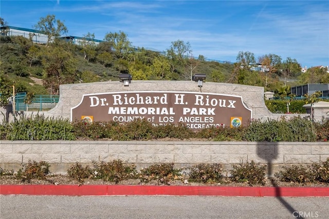 view of community sign