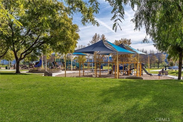 view of play area featuring a lawn