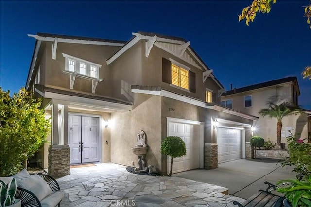 view of front facade with french doors and a garage