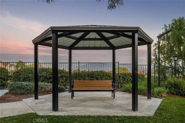 patio terrace at dusk with a gazebo