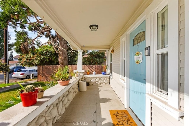 view of patio featuring a porch