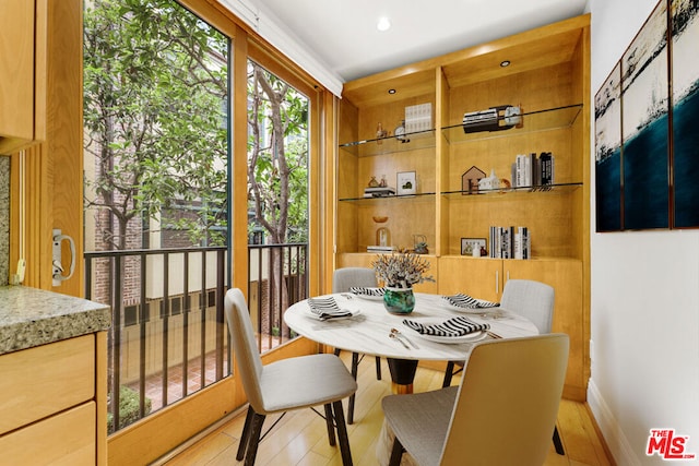 dining room with light hardwood / wood-style flooring