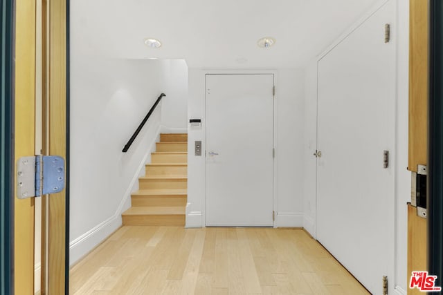 foyer entrance featuring light hardwood / wood-style floors