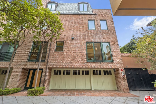 view of property featuring a garage