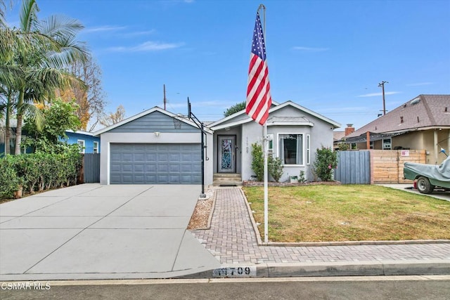 ranch-style home with a garage and a front lawn