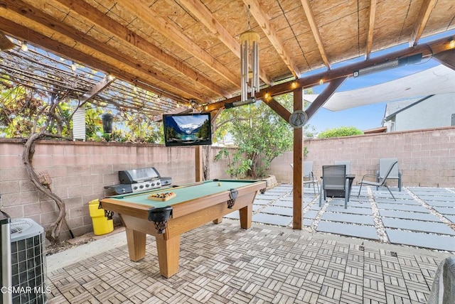 view of patio with area for grilling and central air condition unit