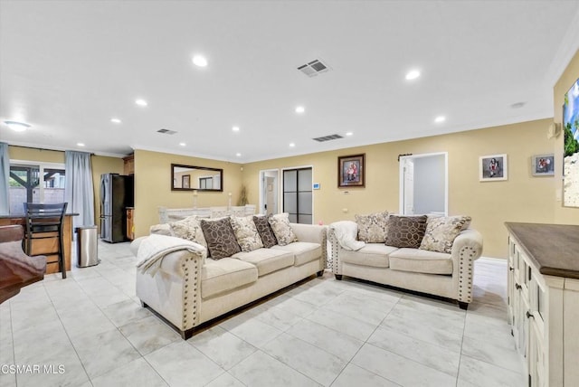 living room featuring ornamental molding