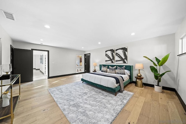 bedroom featuring light wood-type flooring