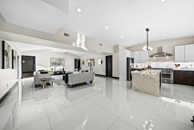 living room featuring lofted ceiling