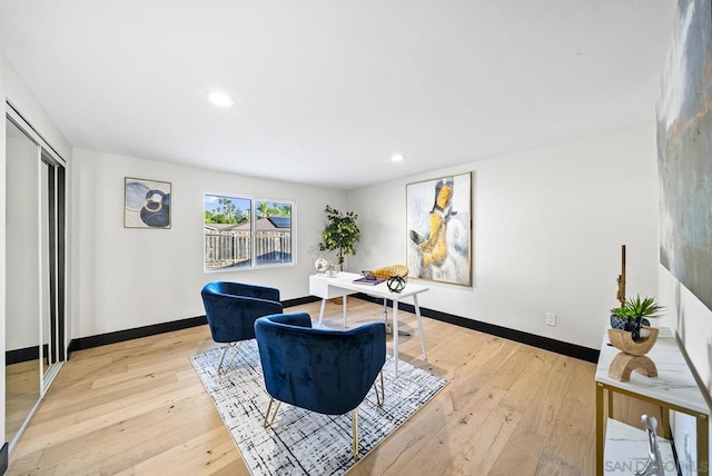 living room with light hardwood / wood-style floors