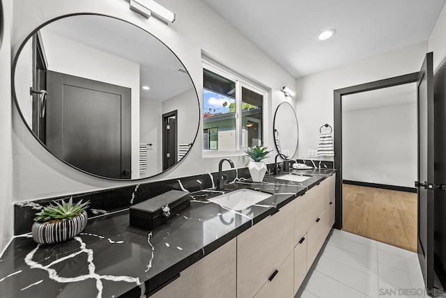 bathroom with vanity and tile patterned floors