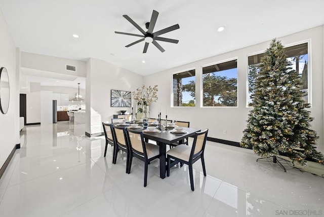 dining area with ceiling fan