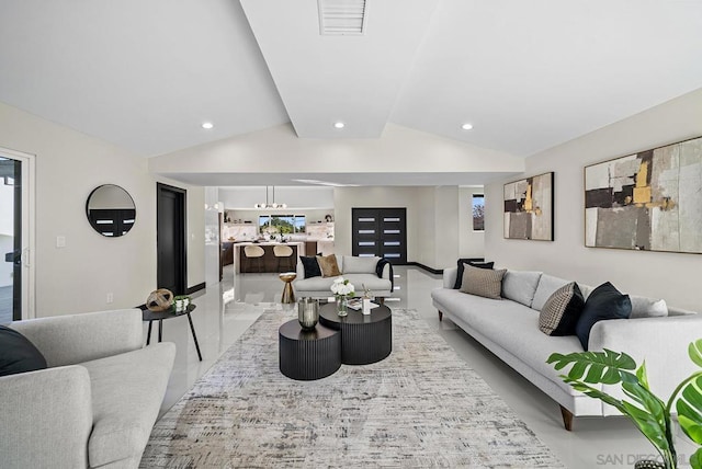 living room with vaulted ceiling