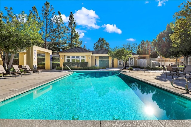 view of pool featuring a patio