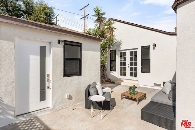 view of patio / terrace with outdoor lounge area and french doors