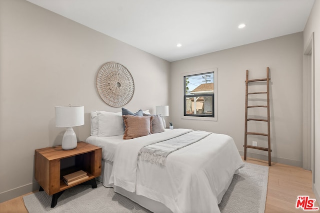 bedroom featuring light hardwood / wood-style flooring