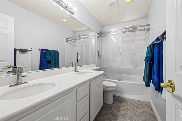 full bathroom featuring vanity, toilet, and enclosed tub / shower combo