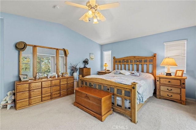 bedroom with carpet, ceiling fan, and lofted ceiling