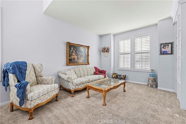 living room featuring light carpet