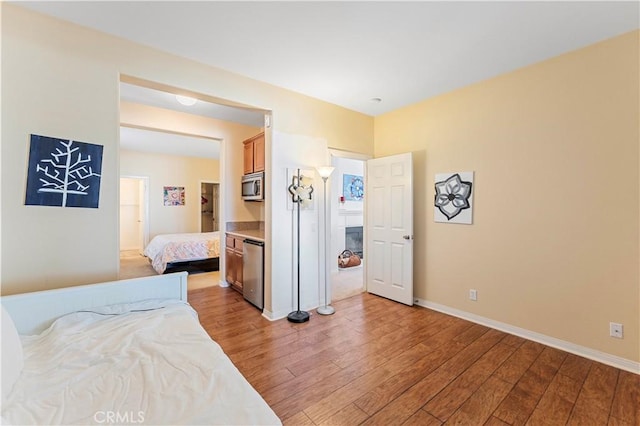 bedroom with light hardwood / wood-style flooring