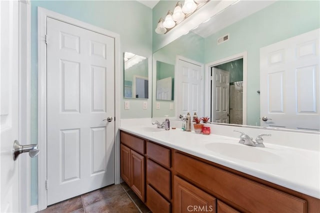 bathroom featuring vanity and tile patterned floors