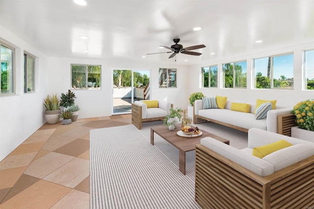 sunroom / solarium with ceiling fan