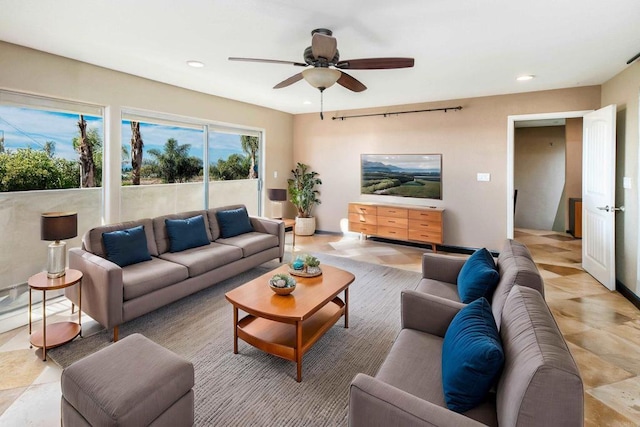 living room with ceiling fan