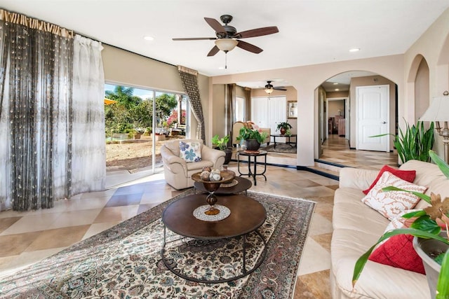 living room with ceiling fan