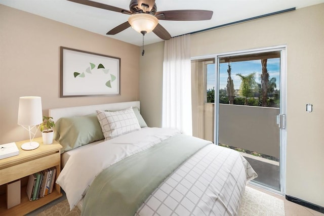 bedroom featuring ceiling fan and access to exterior