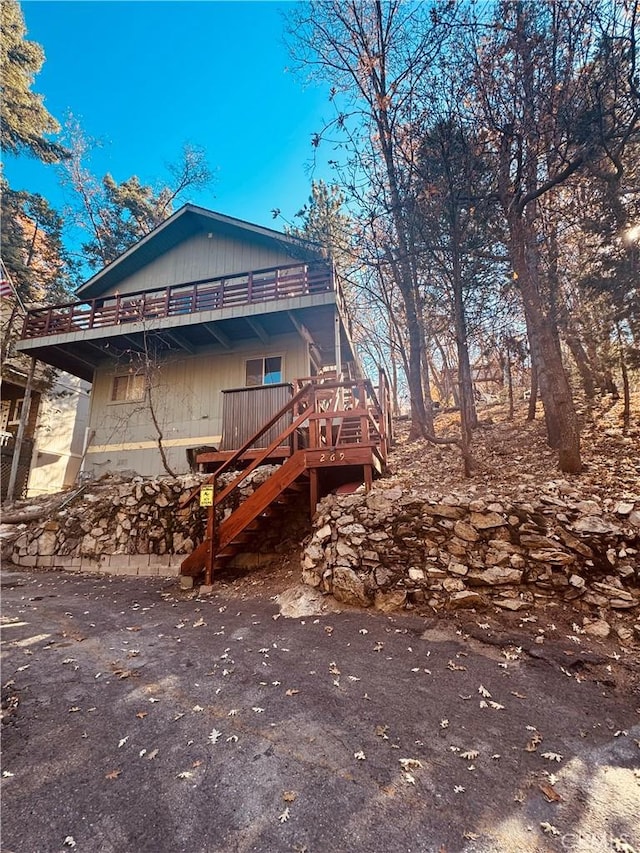 rear view of house with a deck