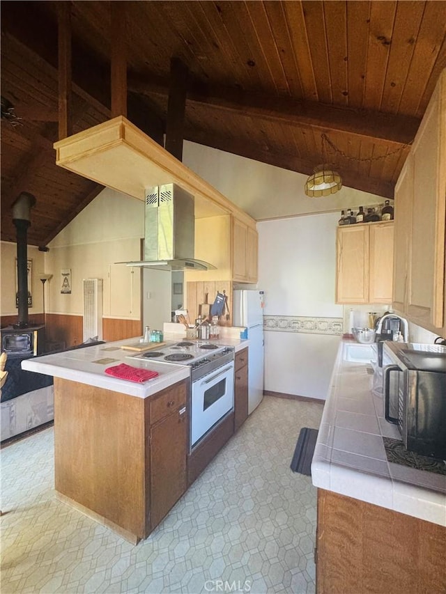 kitchen featuring white appliances, a wood stove, ventilation hood, sink, and beamed ceiling