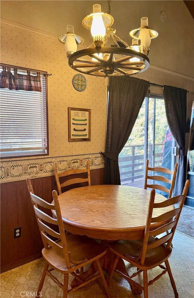 dining space featuring an inviting chandelier