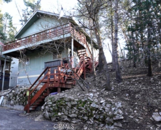 exterior space with a wooden deck