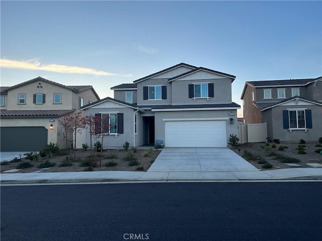 view of front of property with a garage