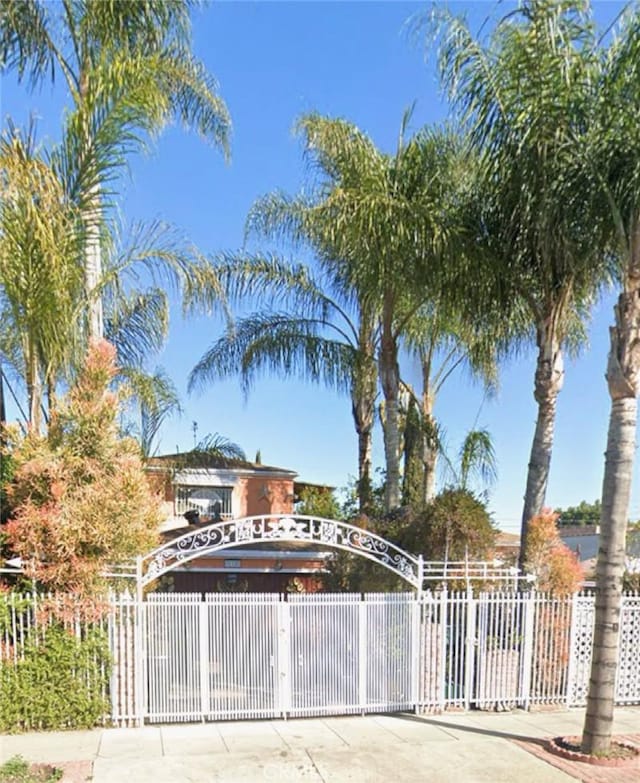 view of gate featuring fence