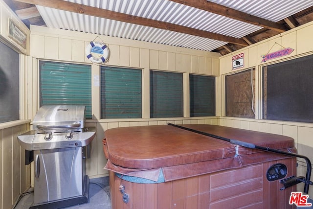 view of patio featuring a hot tub and grilling area