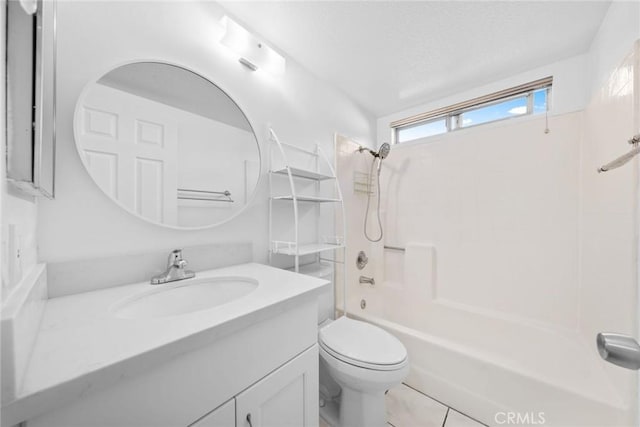 full bathroom with tile patterned floors, vanity,  shower combination, and toilet