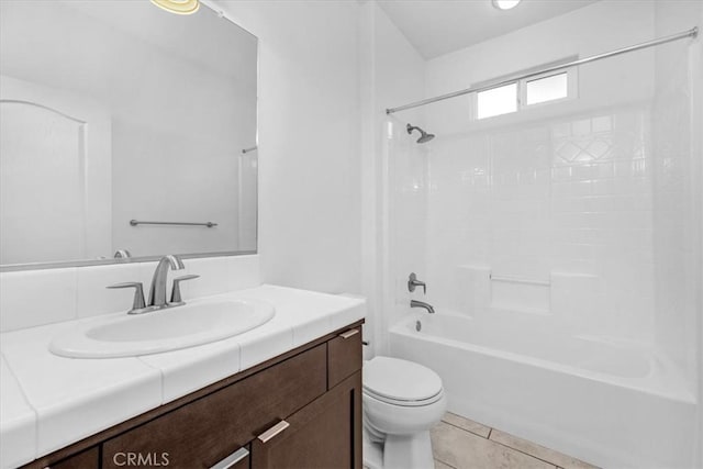 full bathroom featuring tile patterned flooring, vanity, toilet, and shower / tub combination