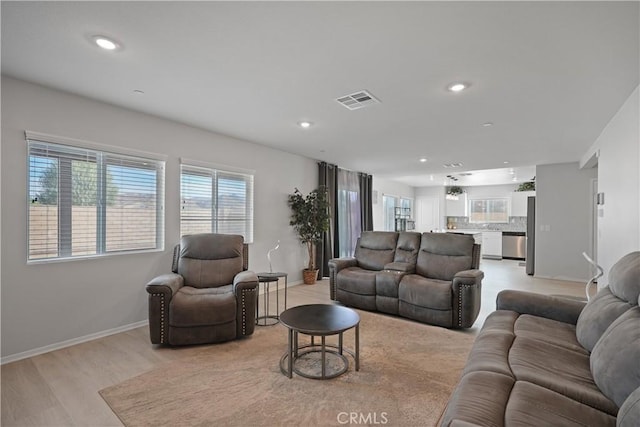 living room with light wood-type flooring