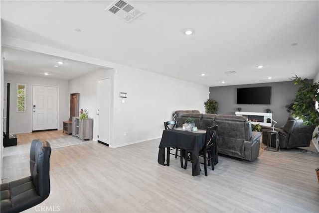 dining area featuring light hardwood / wood-style flooring