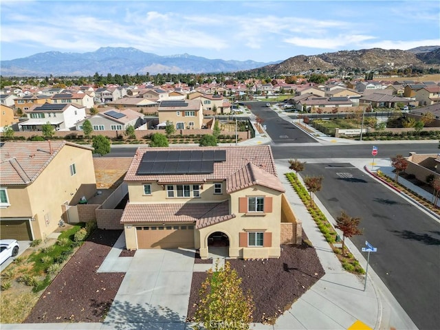 drone / aerial view featuring a mountain view