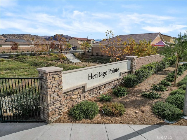 community sign featuring a mountain view