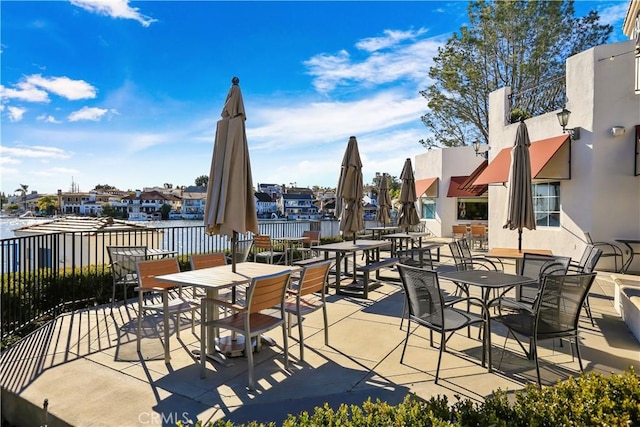 view of patio / terrace featuring a water view