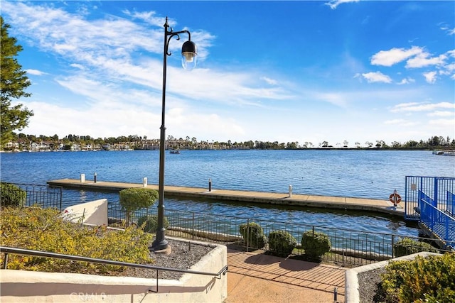 dock area featuring a water view