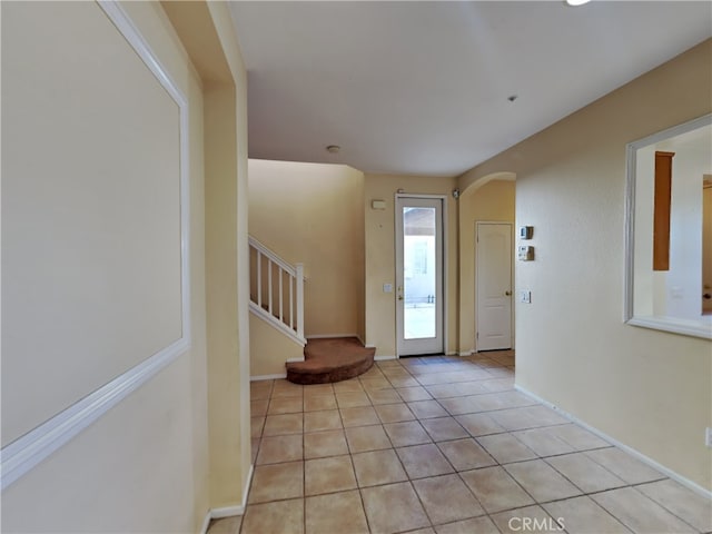 foyer with light tile patterned flooring