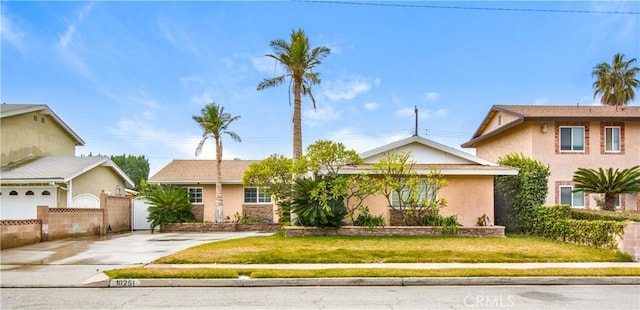 view of front of property with a front lawn